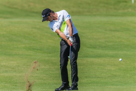 Professional Golfer Simon Thorton swings to strike ball at European PGA Tournament Volvo Golf Champions Tournament play action at Durban Country Club  January 2014 South Africaのeditorial素材