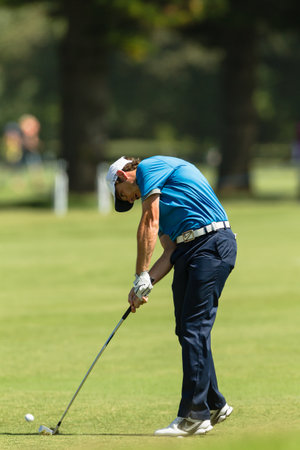 Professional GolferTommy Fleetwood swings to strike ball at European PGA Tournament Volvo Golf Champions Tournament play action at Durban Country Club  January 2014 South Africaのeditorial素材