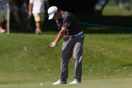 Professional Golfer Louis Oosthuizen swings to strike ball at European PGA Tournament Volvo Golf Champions Tournament play action at Durban Country Club  January 2014 South Africaのeditorial素材
