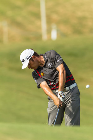 Professional Golfer Louis Oosthuizen, swings to strike ball at European PGA Tournament Volvo Golf Champions Tournament play action at Durban Country Club  January 2014 South Africaのeditorial素材