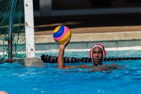 Water-polo national championships game action between province state mens teams in swimming poolのeditorial素材