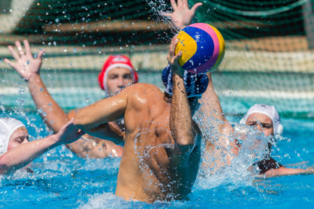 Water-polo national championships game action between province state mens teams in swimming poolのeditorial素材