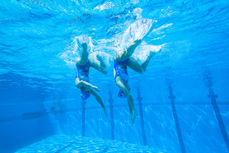 Girls Synchronized swimming in water actionのeditorial素材