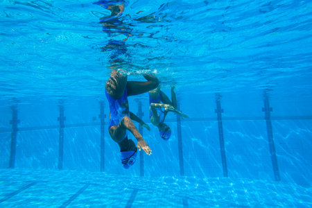 Girls Synchronized swimming in water actionのeditorial素材