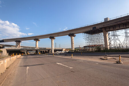 Construction of new civil engineering vehicle highway junction cross-over intersection concrete...