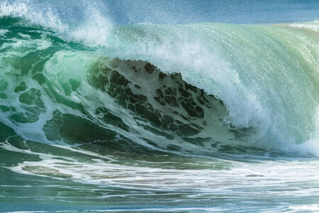 Ocean Wave crashing water energy power of nature close-up detailの写真素材