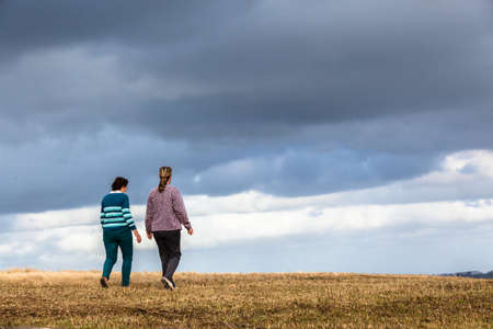 Women girls walking explore outdoors nature reserveの写真素材