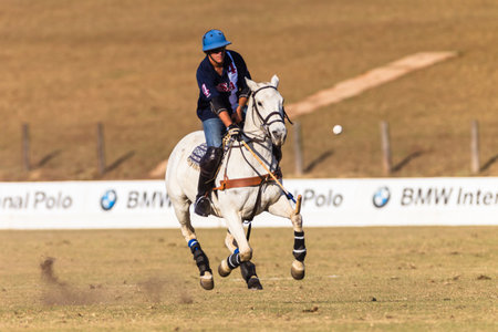 Polo action riders from USA and South Africa international games at Shongweni equestrian grounds outside Durban South-Africaのeditorial素材