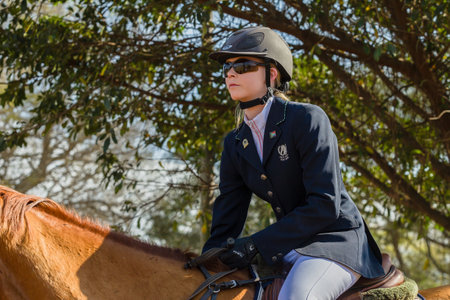 Girl Horse Jumping Nationals Championship  scenes and close-up action of riders men woman at Shongweni Hillcrest outside Durban South Africa  10th Aug 2014のeditorial素材