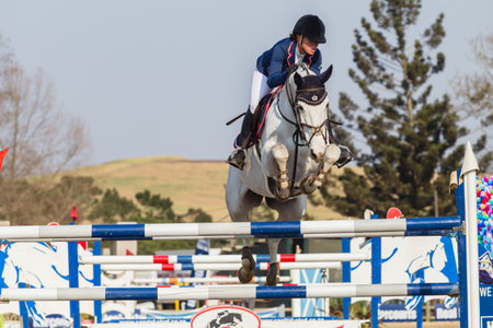 Girl Horse Jumping Nationals Championship  scenes and close-up action of riders men woman at...