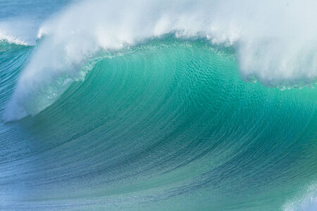 Ocean blue wave closeup water photo of crashing water energyの写真素材