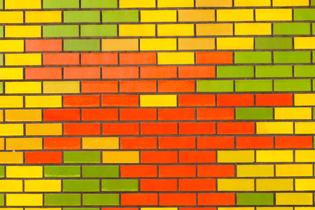 Color brick wall tiles background closeup decor detailの写真素材