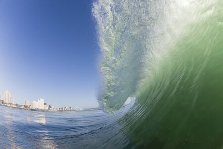 Ocean wave water crashing swell morning Durban beachの写真素材