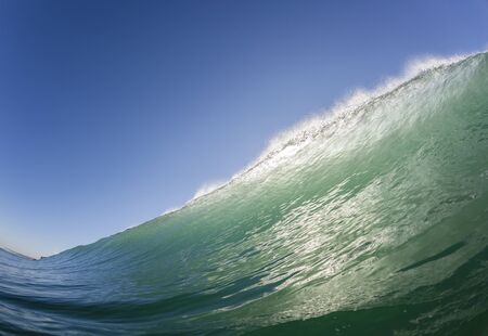 Wave swimming scenic crashing water energyの写真素材