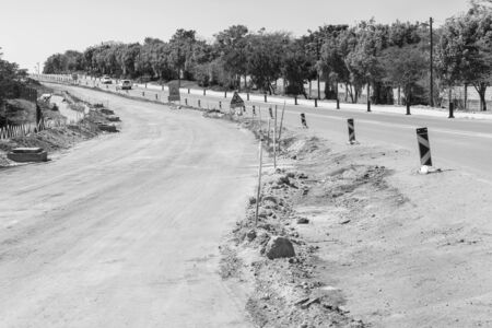 Road construction improvements in black and white vintage tones