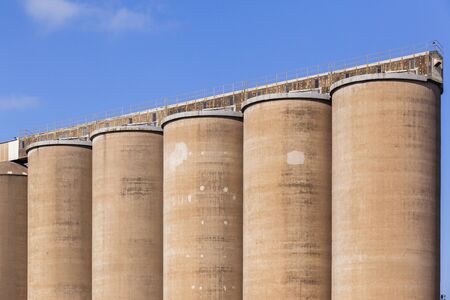 Grain silos concrete structures for agriculture farm harvested wheat maize grain etcの写真素材