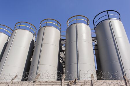 Industrial chemicals liquids  steel storage tanks outdoorsの写真素材