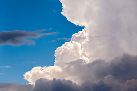 Storm clouds summer afternoon lightening rain brews.の写真素材