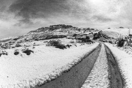 Mountains Snow dirt road mud tracks vintage black white
