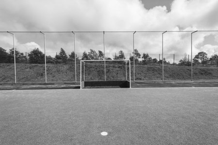 Hockey field astro turf surface new goals field nets vintage black and white.の写真素材