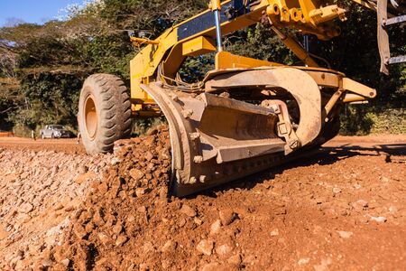 Grader industrial machine on construction of new roads.
