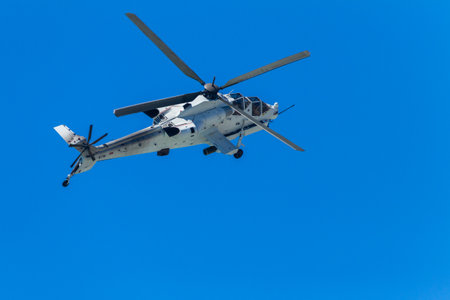 Helicopter military aircraft flying blue sky public event summers day.のeditorial素材