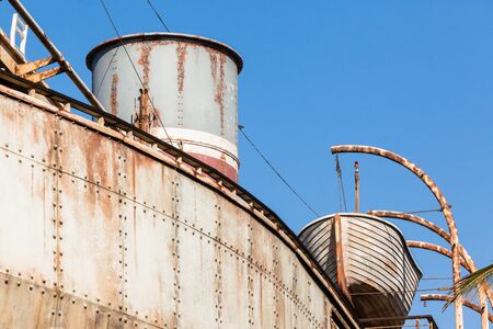 Ship marine engineering vintage rivets steel plates closeup texture background.の写真素材