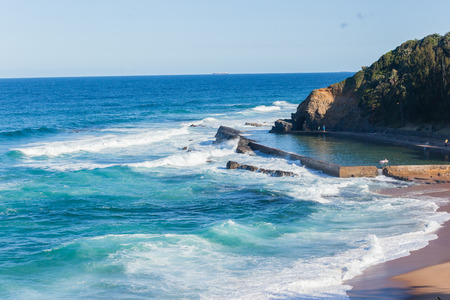 Thompsons Bay beach ocean waves tidal swimming pool coastline landscape.の写真素材