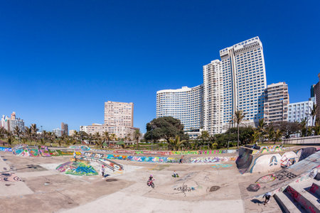 Beach Skateboard Park Durban, South-Africa - 20 Aug 2017: Durban beach front promenade skateboard park ocean  cycling people lifestyle landscape.のeditorial素材