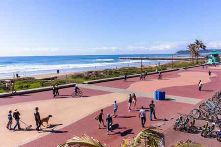 Beach Ocean Promenade Durban, South-Africa - 20 Aug 2017: Durban beach front promenade ocean waves surfers piers cycling people lifestyle landscape.のeditorial素材