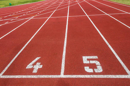Athletics one hundred meters starting line lanes four and five  closeup athletes perspective track...