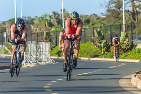 Triathlon National Champs Durban, South-Africa - March 24 , 2019 :  Athletes men cycling road course close-up action second leg of triathlon raceのeditorial素材