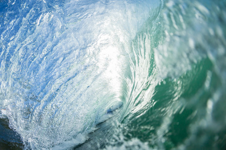 Ocean swimming water photo inside hollow crashing wave.の写真素材