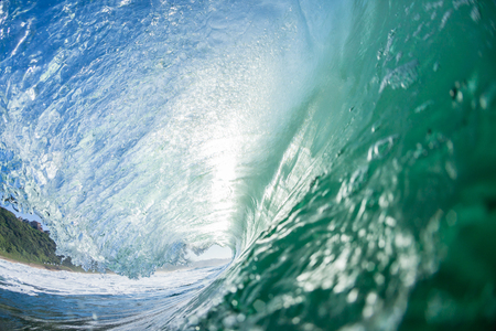 Ocean swimming water photo inside hollow crashing wave.の写真素材