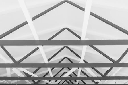 Building inside hall open plan structure wood trusses beams open plan decor in black and white...