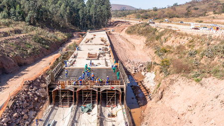 Construction Industry Infrastructure of new road highway rain flooding water tunnels  halfway progress of underground building structure.の写真素材