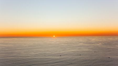 Sunset  Signal Hill watching viewing sun down a scenic moment on the horizon over the Atlantic ocean Cape-Town.の写真素材