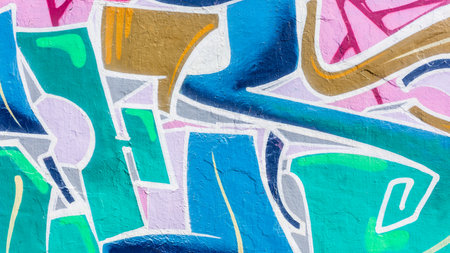 Art Abstract design shapes curves closeup colors contrasts unrecogizabe detail sprayed on public building wall.の写真素材