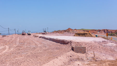 Construction New Roads Earthworks Civil Engineering moving sand compressing surfaces with heavy machines outdoors countryside economy expansion projects.の写真素材