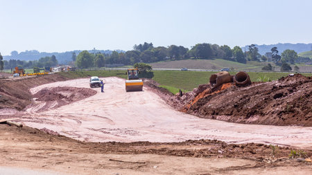 Construction New Roads Earthworks Civil Engineering moving sand compressing surfaces with heavy machines outdoors countryside economy expansion projects.の写真素材