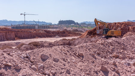 Construction New buildings Roads Earthworks Civil Engineering moving sand  with heavy exscavator machines outdoors countryside economy expansion projects.の写真素材