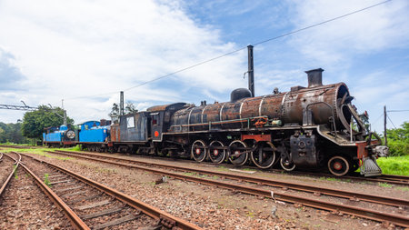 Steam Train Locomotive end of the railway line tracks rusting broken and rotting graveyard of transport history.の写真素材