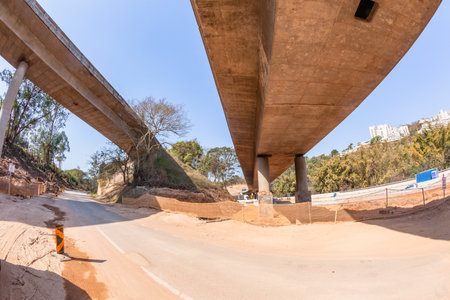 Industrial Road Highways Expansion of bridge ramp flyovers strengthening concrete foundations earthwork on going projects construction landscape.の写真素材