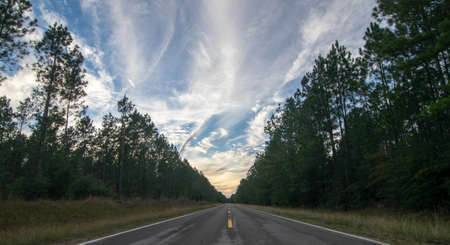 late afternoon sky in rural Louisiana from the highway  centerline