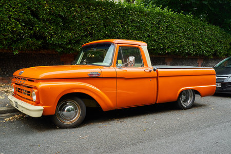 Ramsgate, United Kingdom - June 29, 2021: A mid sixties orange Ford F100 Pickup Truck