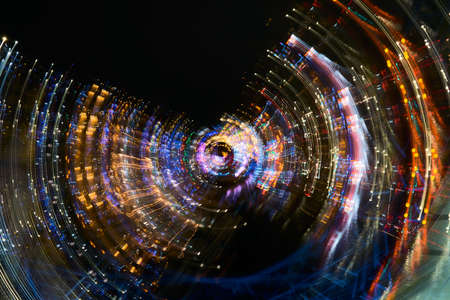 Rotation of bright abstract multicolour lights and shapesの写真素材