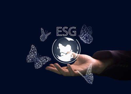 Man hand holding ESG icon concept, Environmental, social and corporate governance , idea for...