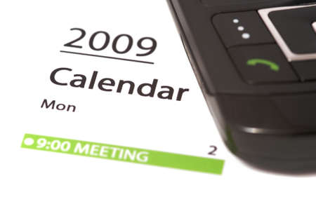 2009 Calendar showing 9:00 meeting and mobile phone.