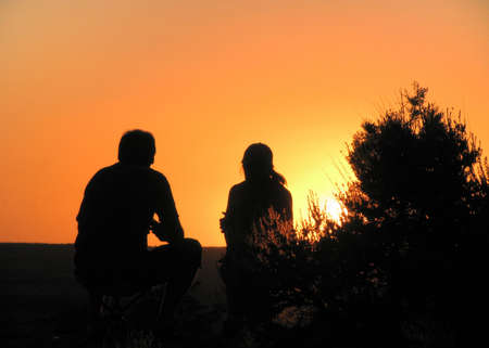 Couple watch the sun setの写真素材