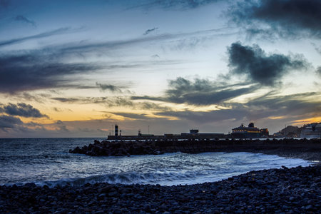 Atmospheric sunset at the harbor in Funchal (Maderia, Portugal)